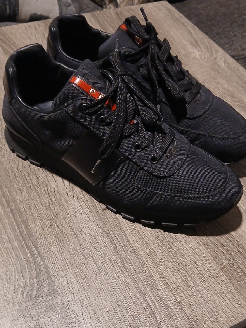 Prada Black Sneakers with Red Accent